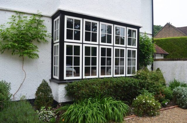 woodgrain upvc bay window