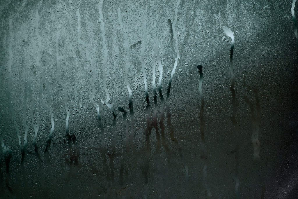 close up of window with condensation