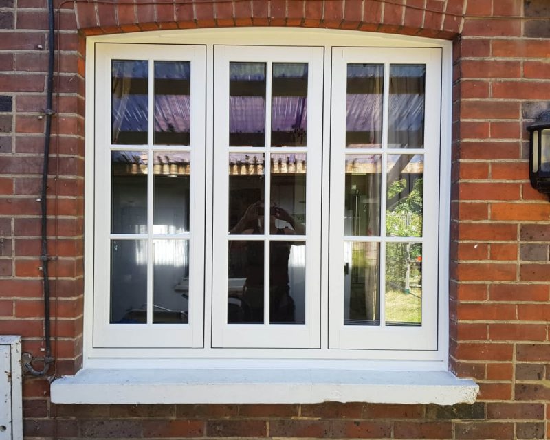 Timber flush sash window in white