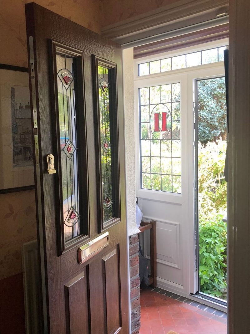 dark wooden solidor front door and porch opening