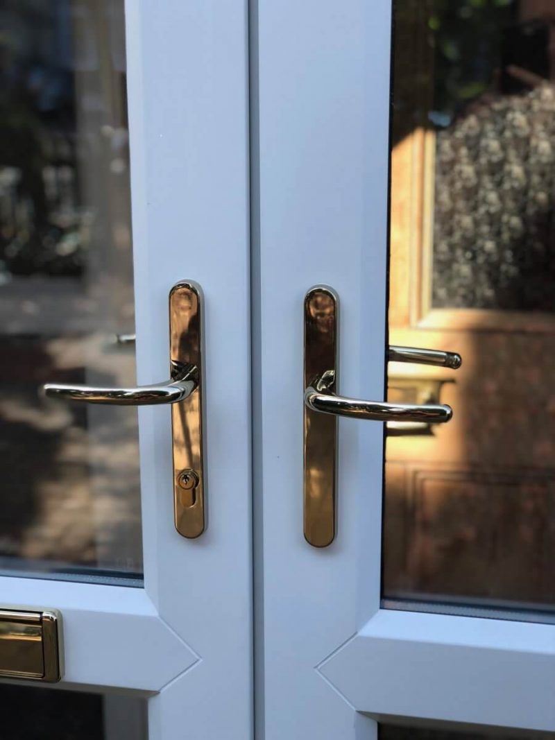 white upvc arched door handles