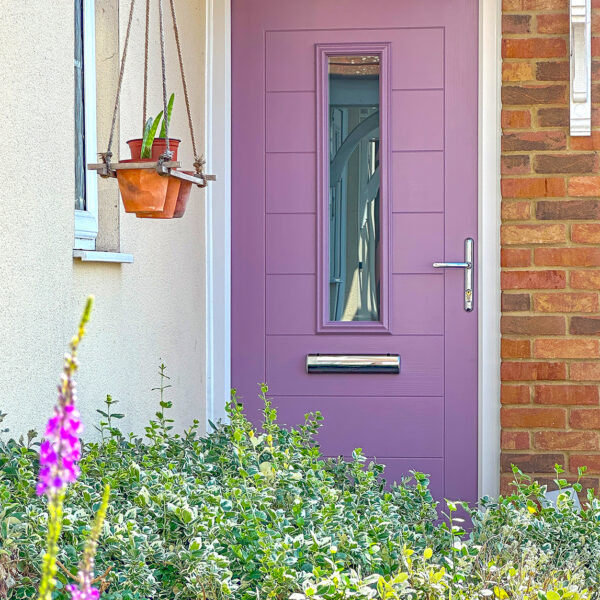 a purple door with plants