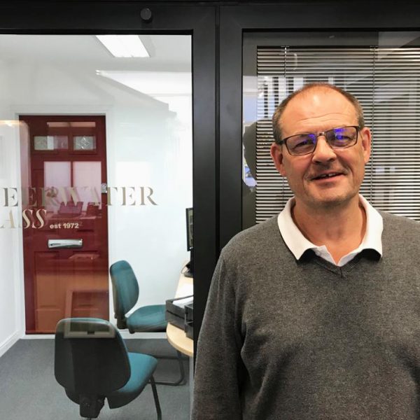 gordon close up with sheerwater logo on glass in background