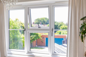 inside white uPVC slimline double glazed windows silver handles