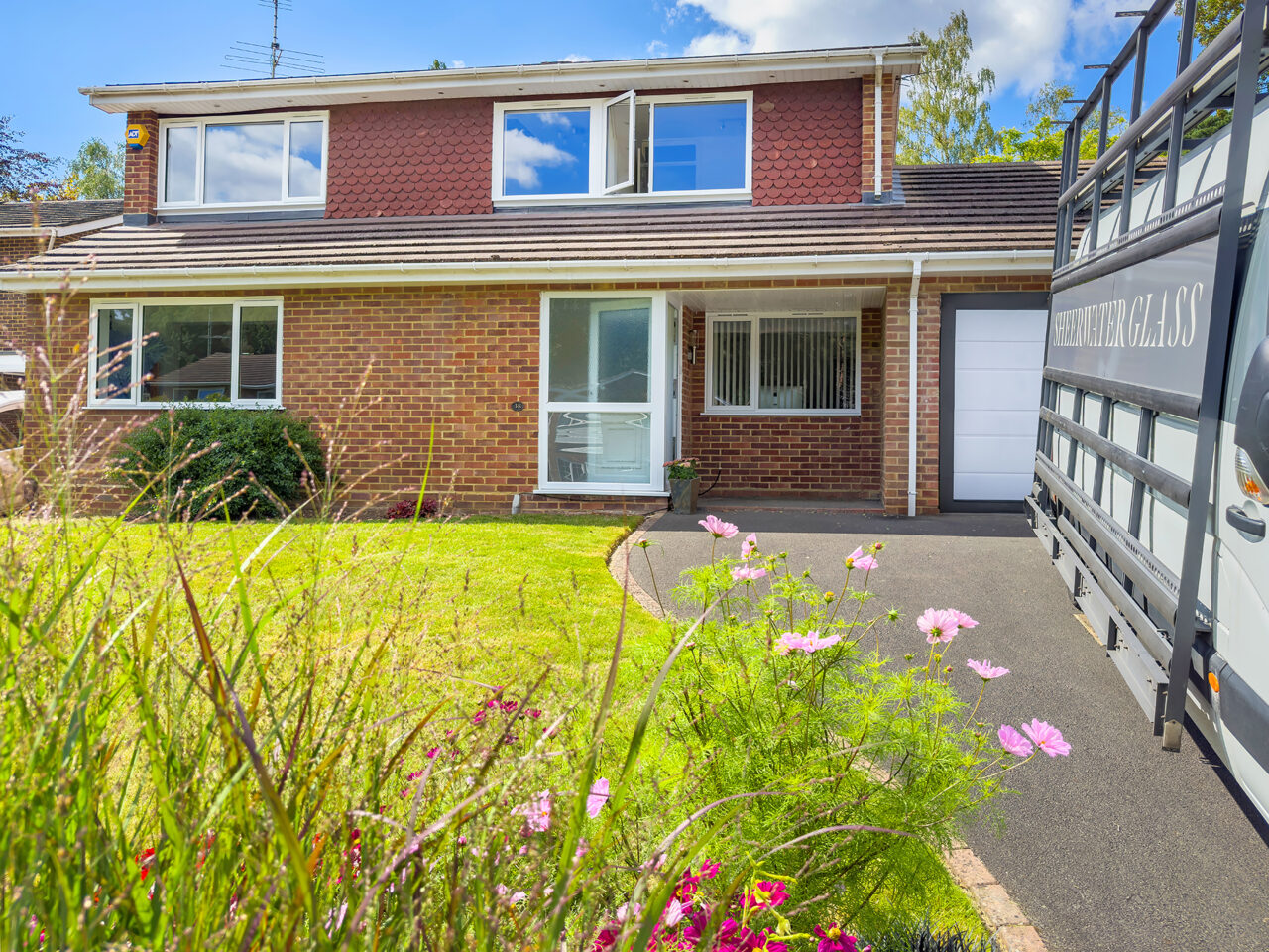 House with White Slimline uPVC windows