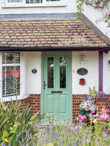 green front door cottage