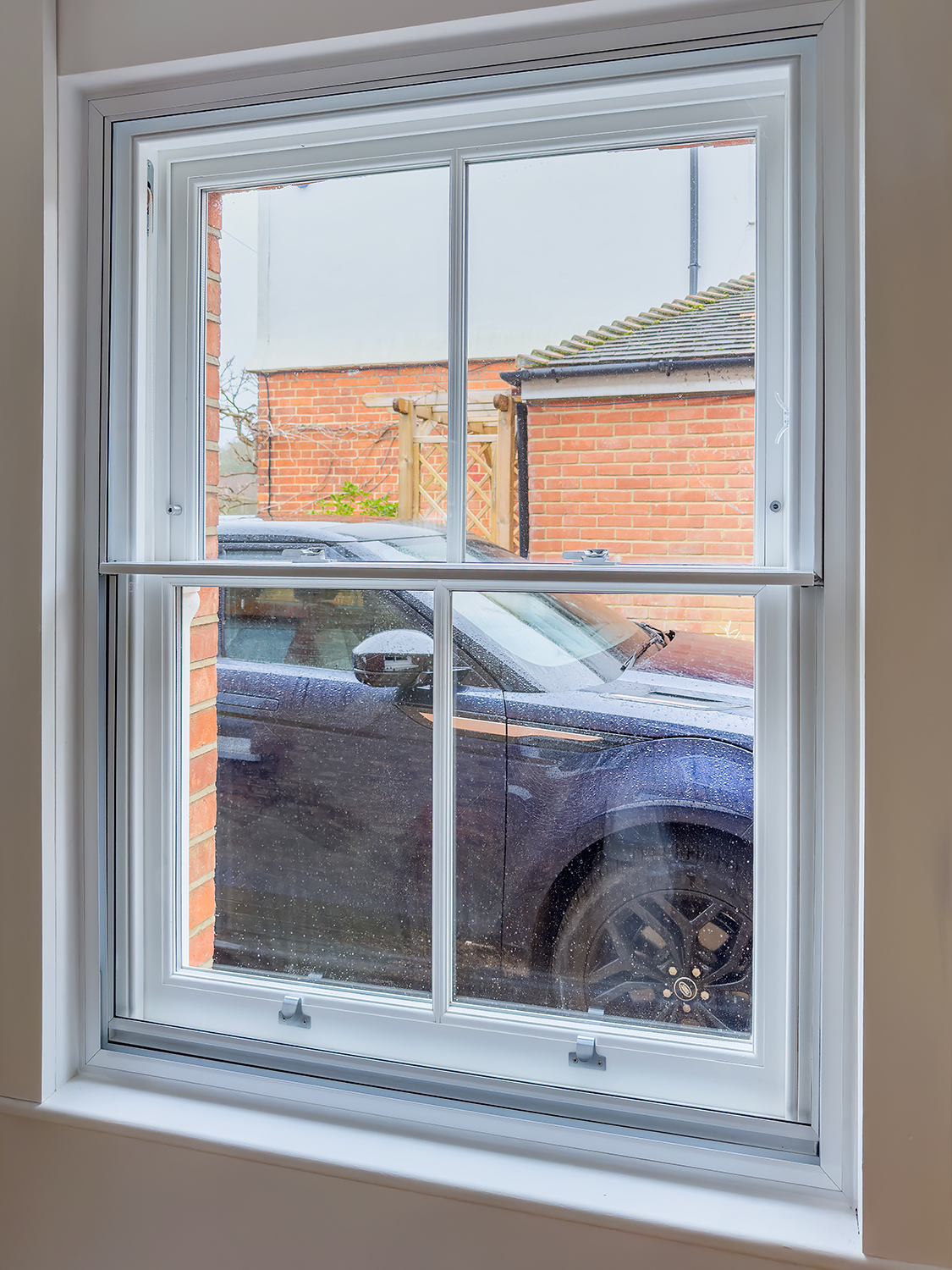 Secondary Glazing window with a sash window