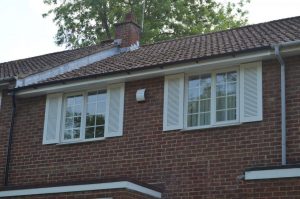 soffits and fascias white windows front of house