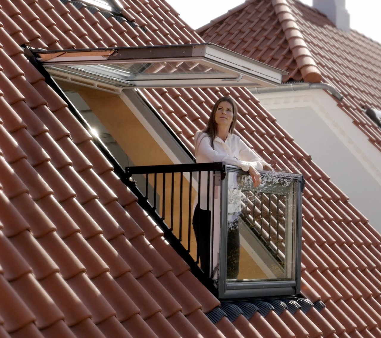 Woman on Roof Balcony Sheerwater Glass