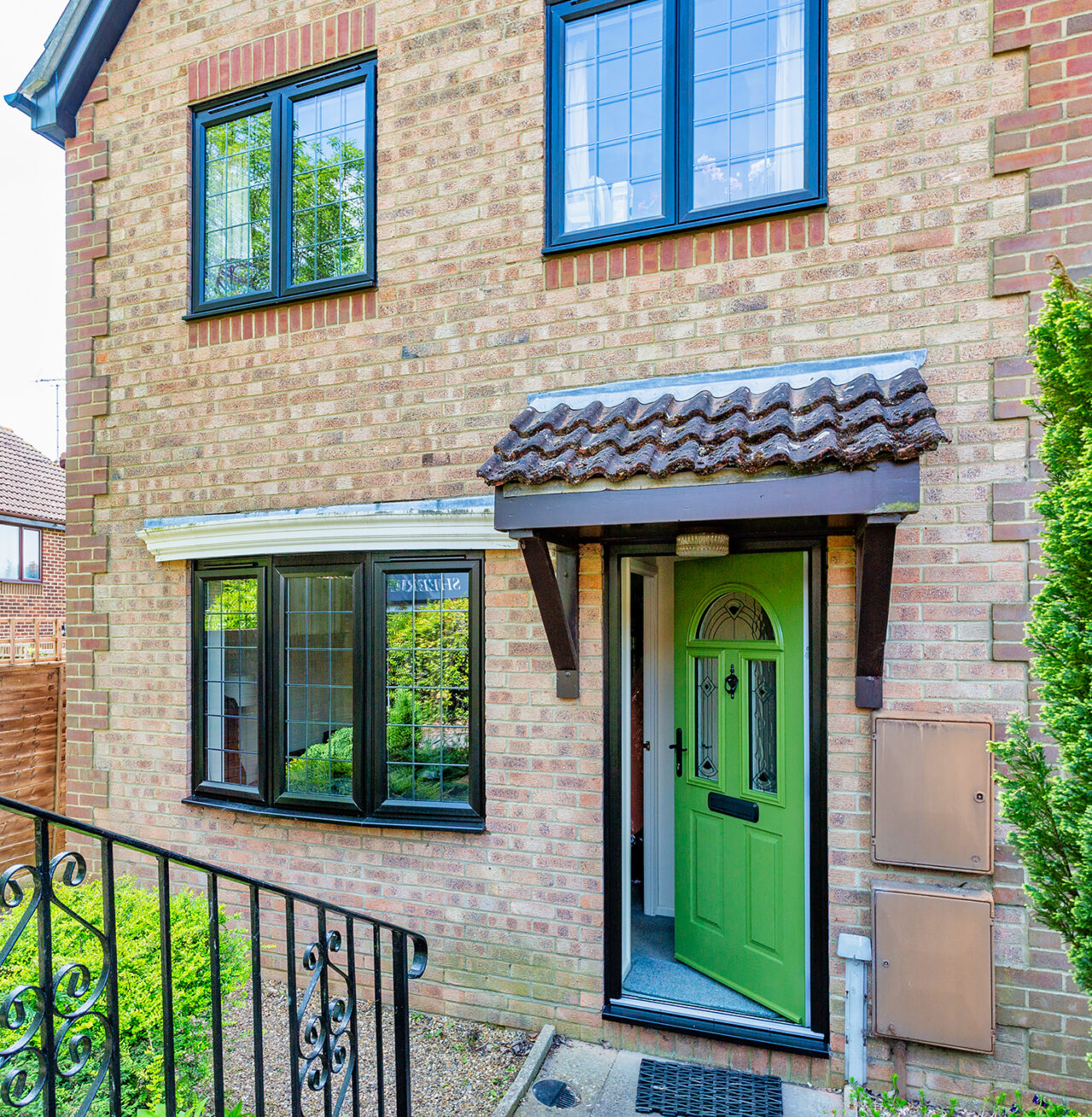 Black/Brown Slimline Windows and Composite Front Door Sheerwater Glass