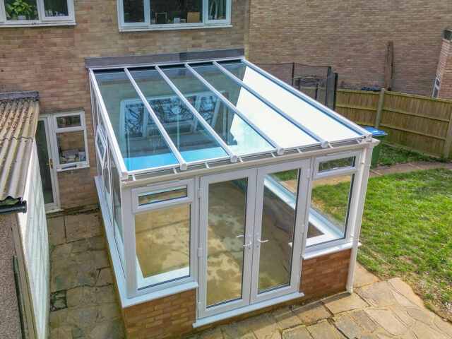 Conservatory with self-cleaning glass